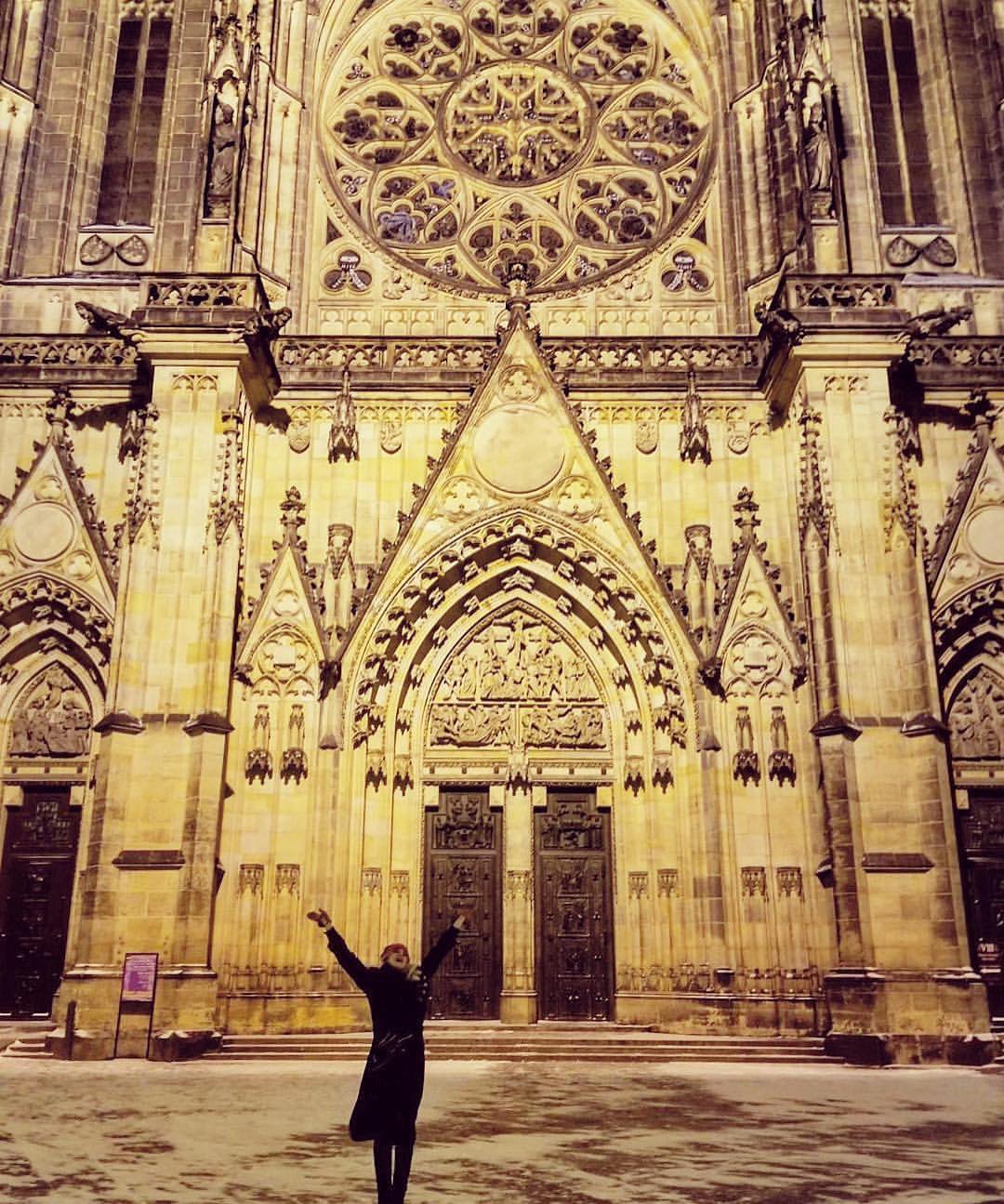 woman standing outside of Prague castle 